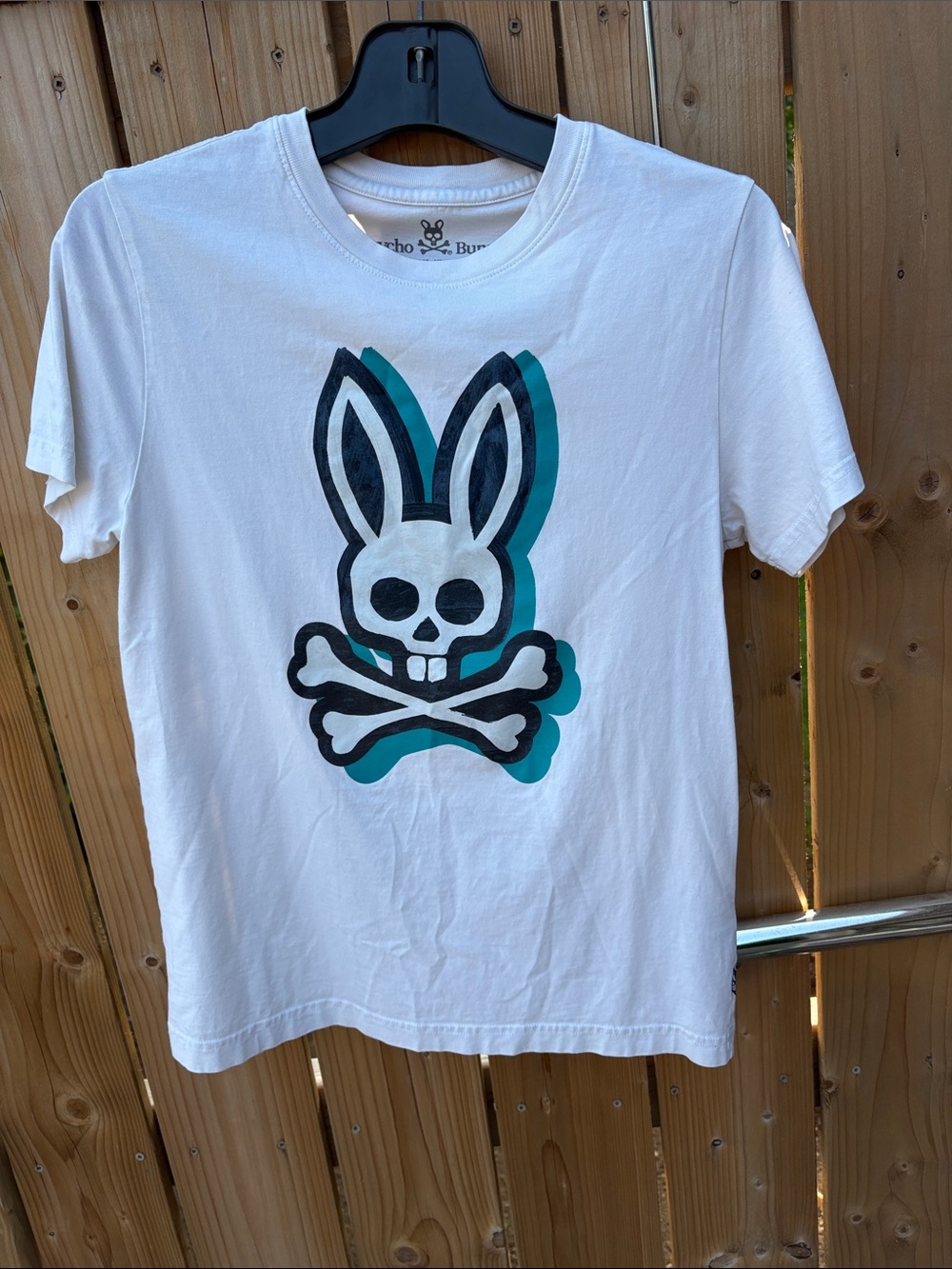 Psycho Bunny White Tee with Black & Teal Skull Bunny Graphic
